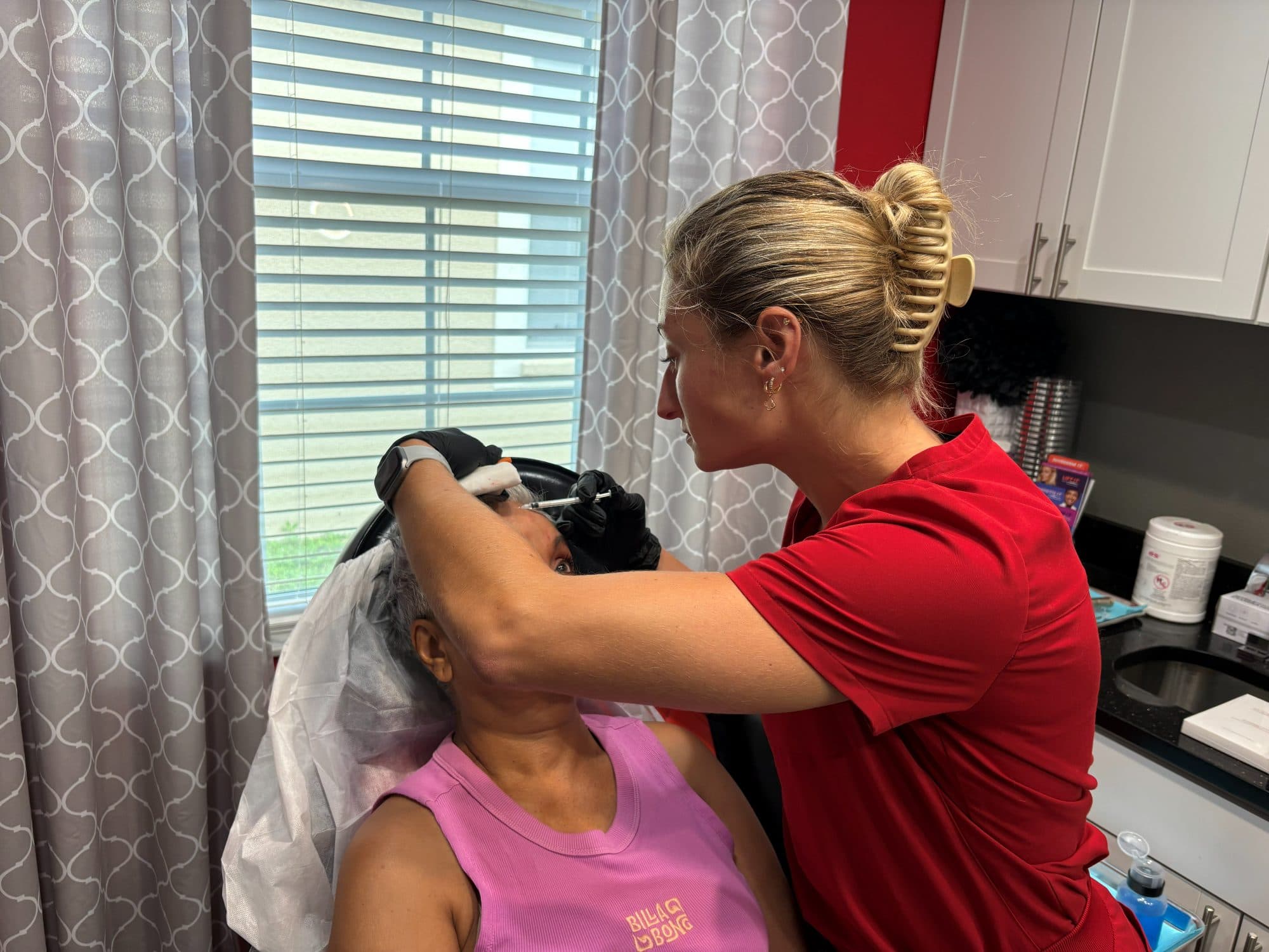 Close-up of a facial aesthetic treatment in progress at Padgett Medical Center in Tampa